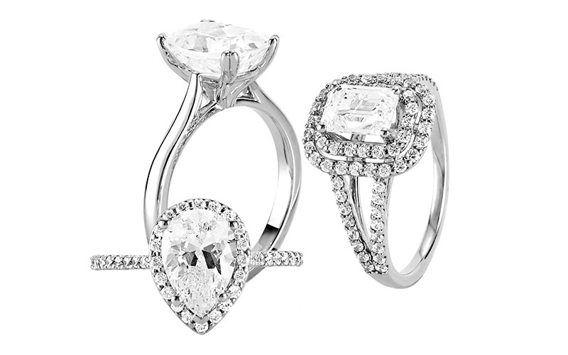 Three diamond engagement rings in platinum and 18ct white gold, from Lanes Fine Jewellery, Stamford